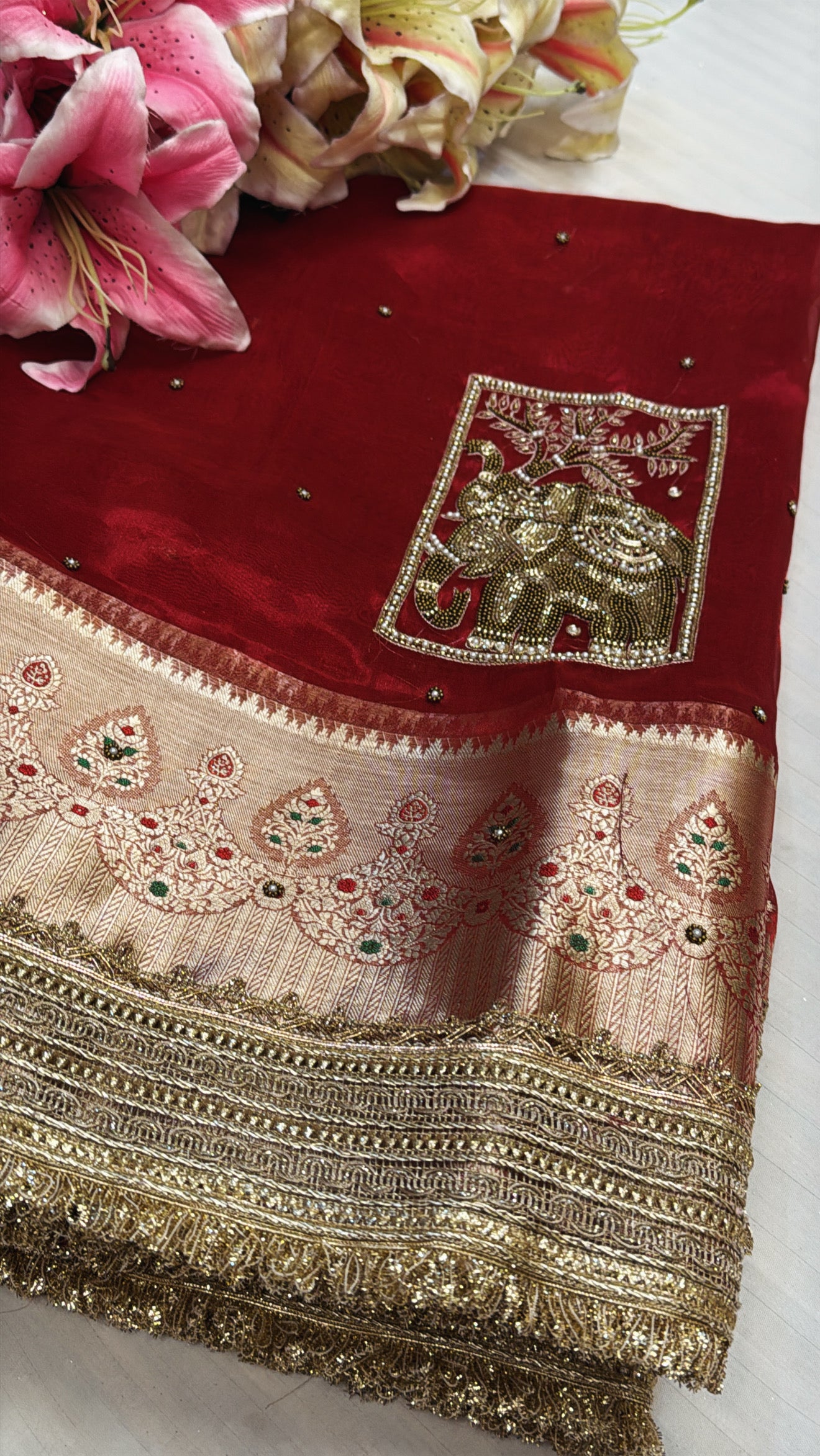 Red special - Husn hot red tissue silk elephant motif hand embroidered saree
